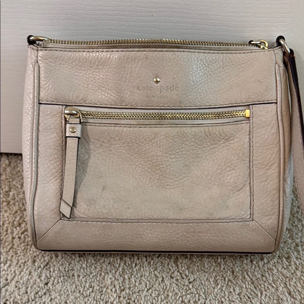 Kate Spade Cream Crossbody Bag with Minimalist Design